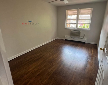 42-10 28th Avenue - Photo Thumbnail 1