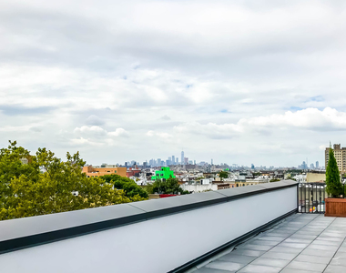 1534 Putnam Ave - Photo Thumbnail 2