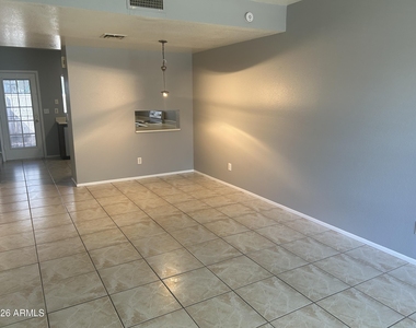 7801 N 44th Drive - Photo Thumbnail 1