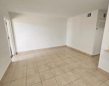 1150 Ne 17th Court - Photo Thumbnail 2