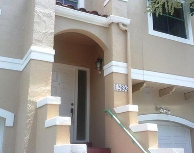 12695 Nw 14th Place - Photo Thumbnail 1