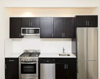 338 East 55th Street - Photo Thumbnail 3