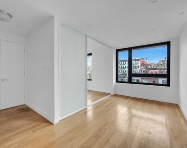 419 E 117th Street - Photo Thumbnail 1