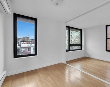 419 E 117th Street - Photo Thumbnail 3