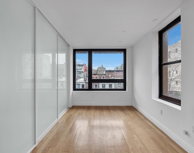 419 E 117th Street - Photo Thumbnail 6