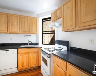 406 W 48th Street - Photo Thumbnail 3