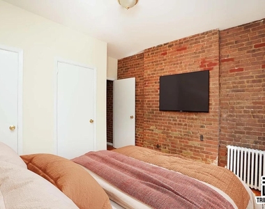 406 W 48th Street - Photo Thumbnail 2