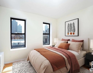 406 W 48th Street - Photo Thumbnail 1