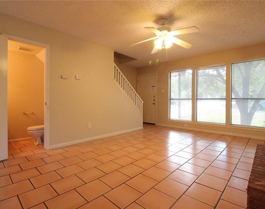 9002 Sanger Dr - Photo Thumbnail 2