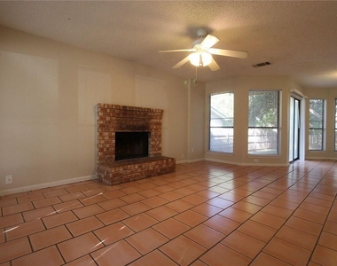 9002 Sanger Dr - Photo Thumbnail 1