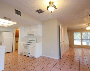 9002 Sanger Dr - Photo Thumbnail 4