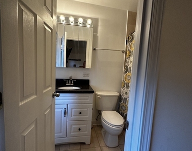 1711 W Jarvis Avenue - Photo Thumbnail 16