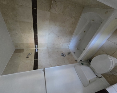 1711 W Jarvis Avenue - Photo Thumbnail 11