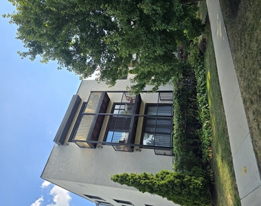 1711 W Jarvis Avenue - Photo Thumbnail 2