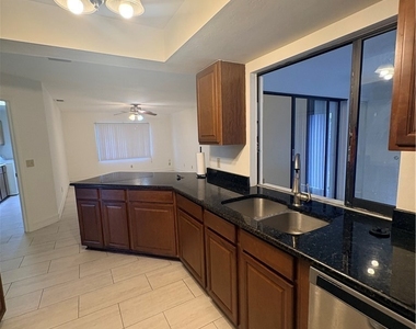5113 Chiquita Boulevard S - Photo Thumbnail 1
