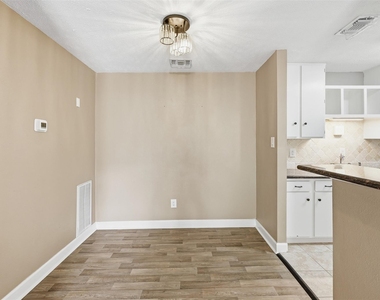 9707 Richmond Street - Photo Thumbnail 1