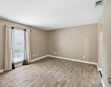 9707 Richmond Street - Photo Thumbnail 5