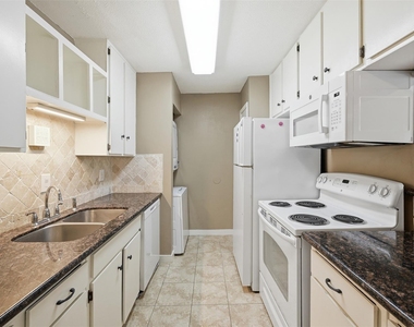 9707 Richmond Street - Photo Thumbnail 2