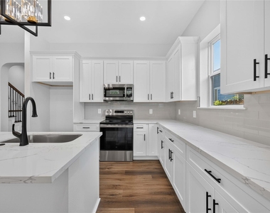 8215 Gladstone Street - Photo Thumbnail 8