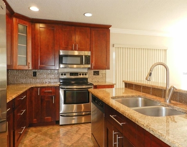 10837 Kensington Park Avenue - Photo Thumbnail 8