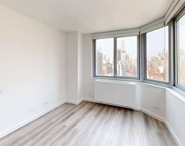 401 E 34th St - Photo Thumbnail 4
