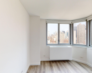 401 E 34th St - Photo Thumbnail 2