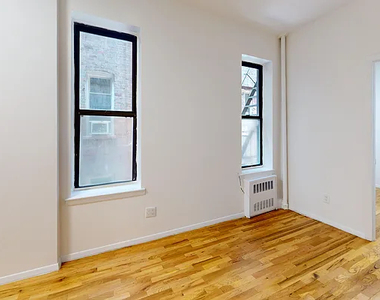425 East 65th Street - Photo Thumbnail 1