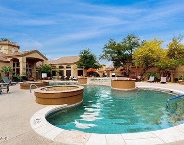 7050 E Sunrise Drive - Photo Thumbnail 1