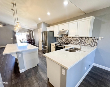 6620 W Watkins Street - Photo Thumbnail 7