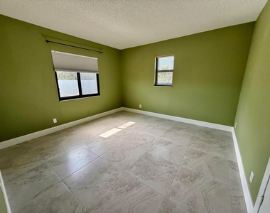 1691 W 26th Street - Photo Thumbnail 2