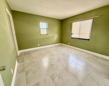 1691 W 26th Street - Photo Thumbnail 2