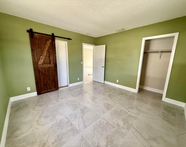 1691 W 26th Street - Photo Thumbnail 4