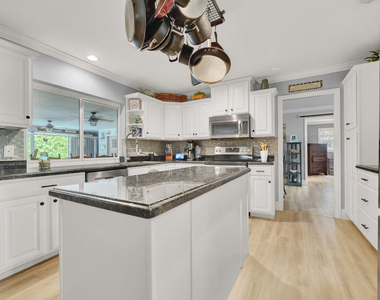 10015 Daisy Avenue - Photo Thumbnail 14