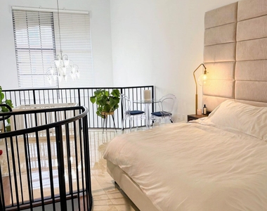 801 S Olive Avenue - Photo Thumbnail 3