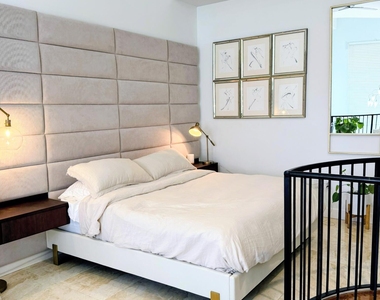 801 S Olive Avenue - Photo Thumbnail 2