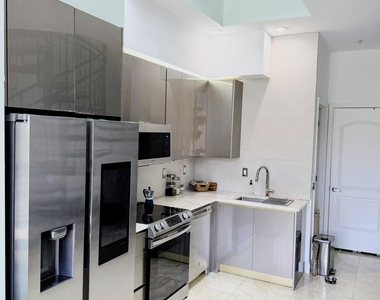 801 S Olive Avenue - Photo Thumbnail 1