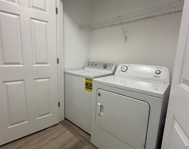 14108 Riding Hill Avenue - Photo Thumbnail 10