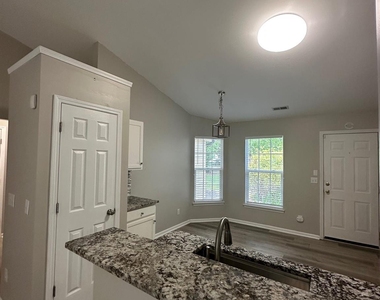 14108 Riding Hill Avenue - Photo Thumbnail 4