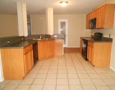 9512 George Washington Drive - Photo Thumbnail 2