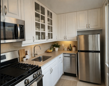 E 28TH ST - Photo Thumbnail 1
