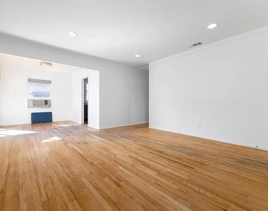6985 Wisconsin Avenue - Photo Thumbnail 7