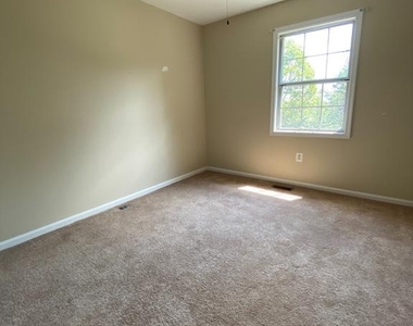 8701 Point Of Woods Drive - Photo Thumbnail 8