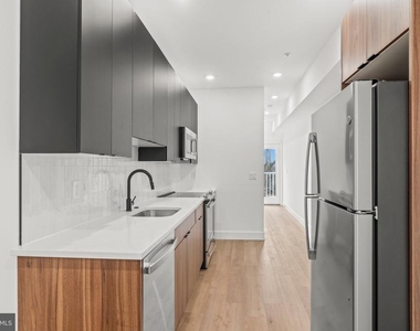 4710 Woodland Avenue - Photo Thumbnail 4