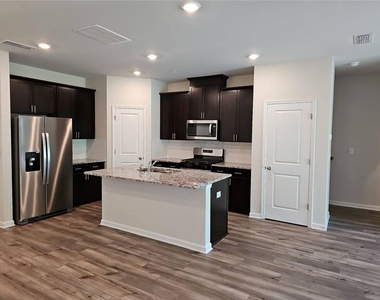 1504 Purple Coneflower Avenue Se - Photo Thumbnail 14