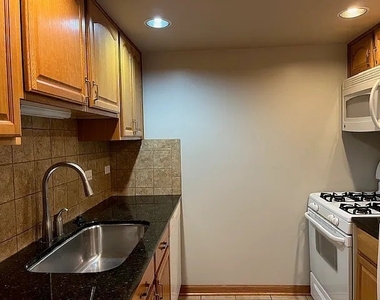 1125 Royal Saint George Drive - Photo Thumbnail 2