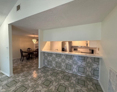 9011 Ketchwood Drive - Photo Thumbnail 4