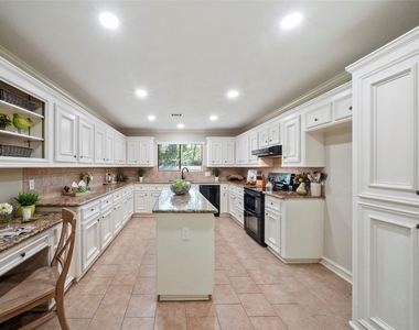 7415 Revelwood Drive - Photo Thumbnail 7