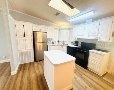 7112 Pine Needle Lane - Photo Thumbnail 2