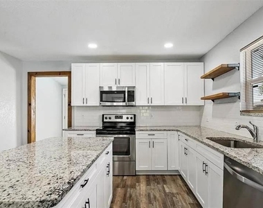 1411 E 24th Avenue - Photo Thumbnail 2
