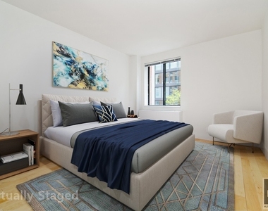 West 53 Street - Photo Thumbnail 2
